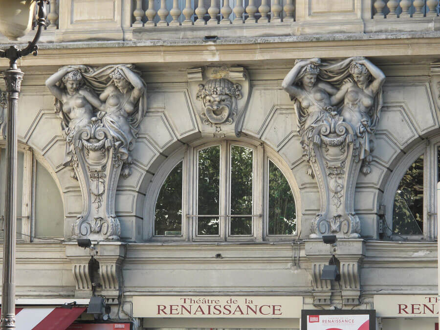 Caryatids on the facade of the Renaissance Theatre in Paris