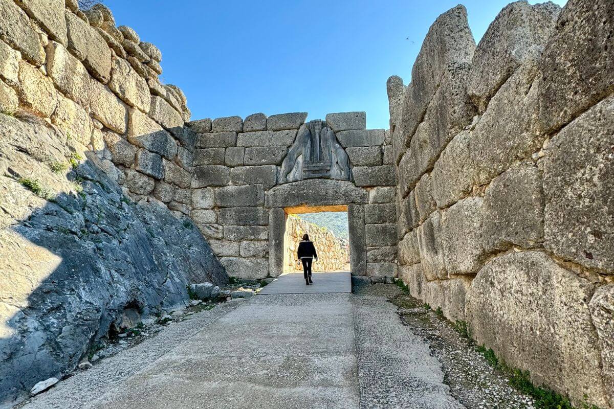 Traveler under The Lion Gate in Mycenae